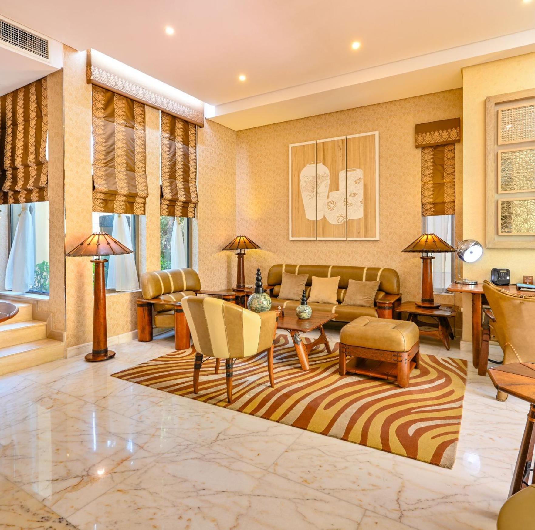 Palavra Resort Манама Екстер'єр фото The interior of a suite at the Taj Mahal Palace, Mumbai