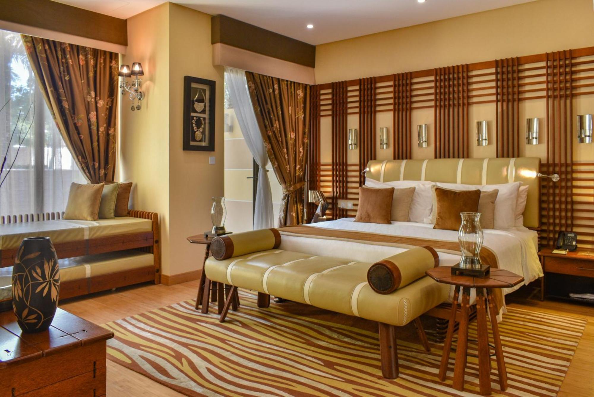 Palavra Resort Манама Екстер'єр фото A bedroom at the Taj Bengal
